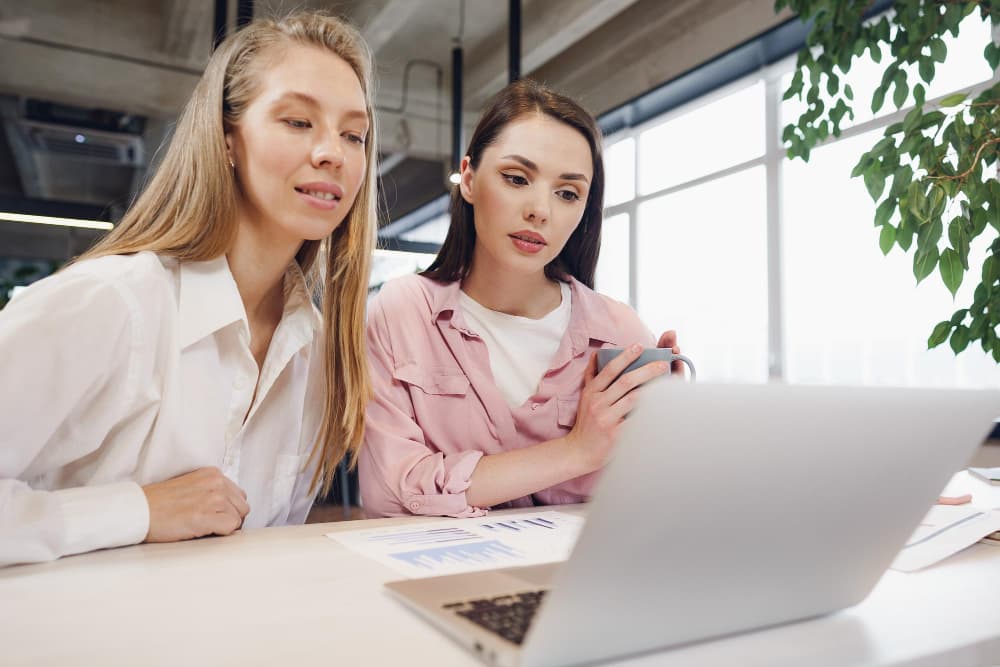 Two women discussing